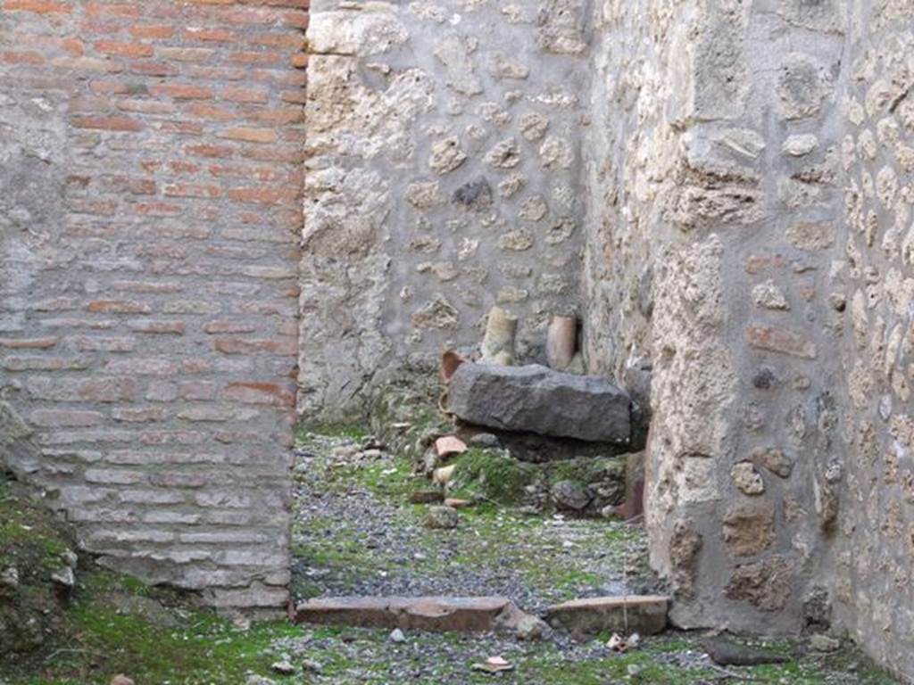 I.11.3 Pompeii.  December 2007.  Kitchen doorway in south wall with remains of hearth.