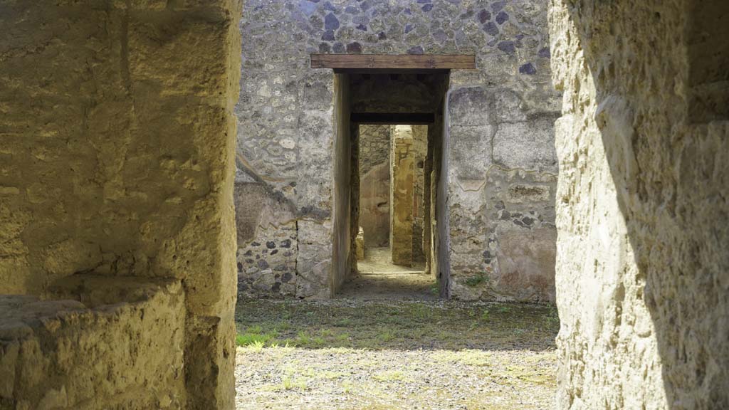 I.12.5 Pompeii. August 2021. Looking south across atrium to corridor leading to garden. Photo courtesy of Robert Hanson.