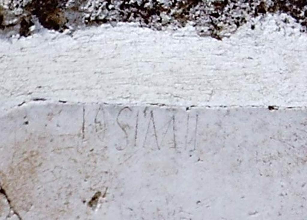 I.13.9 Pompeii. 1966. Inscription from plaster immediately south (left) of doorway. 
Detail from photo J66f0274 by Stanley A. Jashemski.  
According to Epigraphik-Datenbank Clauss/Slaby (See www.manfredclauss.de) this read
 
[Z]osime       [CIL IV 10072b]
See Varone A., 2012. Titulorum Graphio Exaratorum Qui In C.I.L. Vol. IV Collecti Sunt Imagines: Studi SAP 31. Roma: L’Erma di Bretschneider, p. 87.
