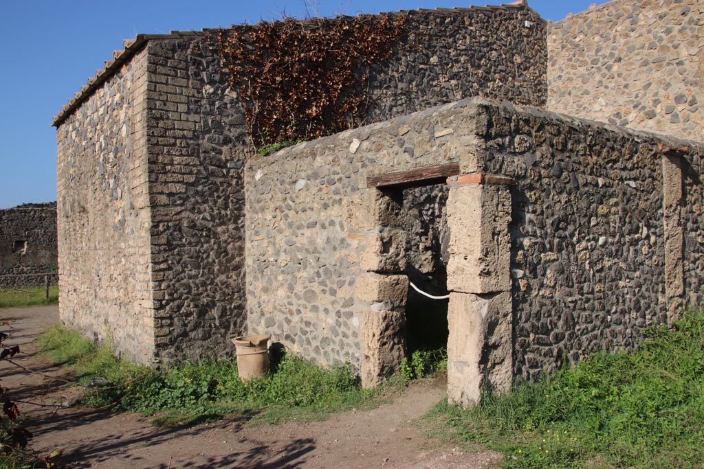 I.15.1 Pompeii. October 2022. Looking north-west towards doorway at rear. Photo courtesy of Klaus Heese.

