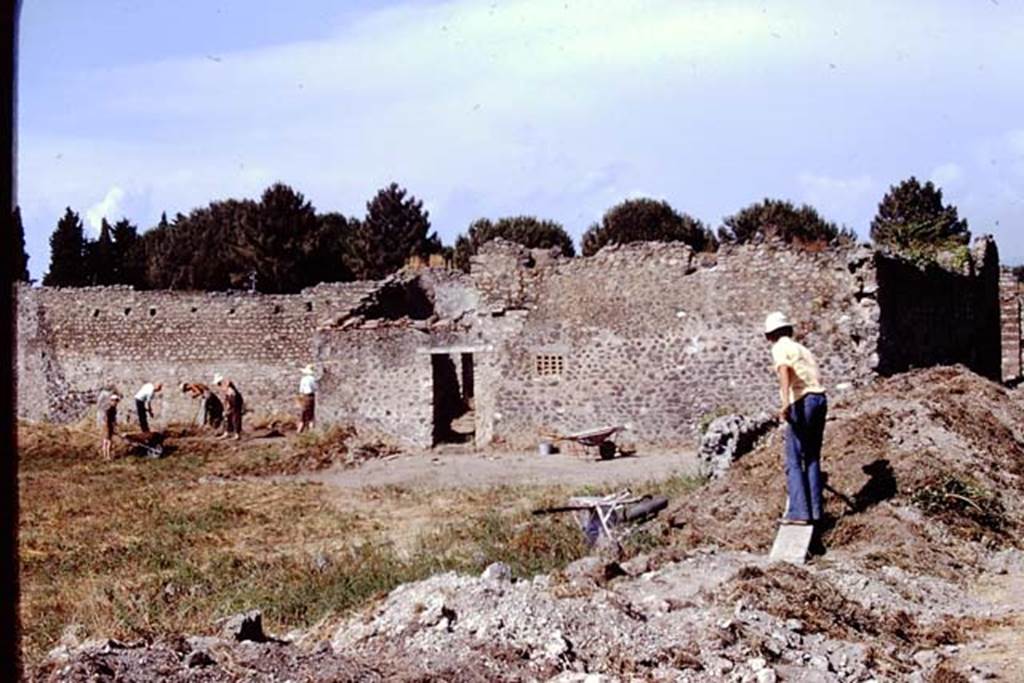 I.15.3 Pompeii. 1972. The excavations starts, looking east across south side of area, towards rear of I.15.5/6.  Photo by Stanley A. Jashemski. 
Source: The Wilhelmina and Stanley A. Jashemski archive in the University of Maryland Library, Special Collections (See collection page) and made available under the Creative Commons Attribution-Non Commercial License v.4. See Licence and use details. J72f0205
