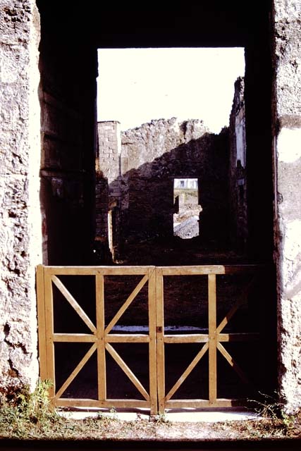 I.15.3 Pompeii. 1972. Entrance on Via di Castricio, looking south.  Photo by Stanley A. Jashemski. 
Source: The Wilhelmina and Stanley A. Jashemski archive in the University of Maryland Library, Special Collections (See collection page) and made available under the Creative Commons Attribution-Non Commercial License v.4. See Licence and use details. J72f0592

