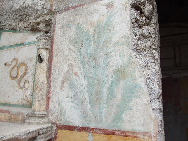 I.16.4 Pompeii. December 2006. Lararium, with detail of garden painting on the north wall..