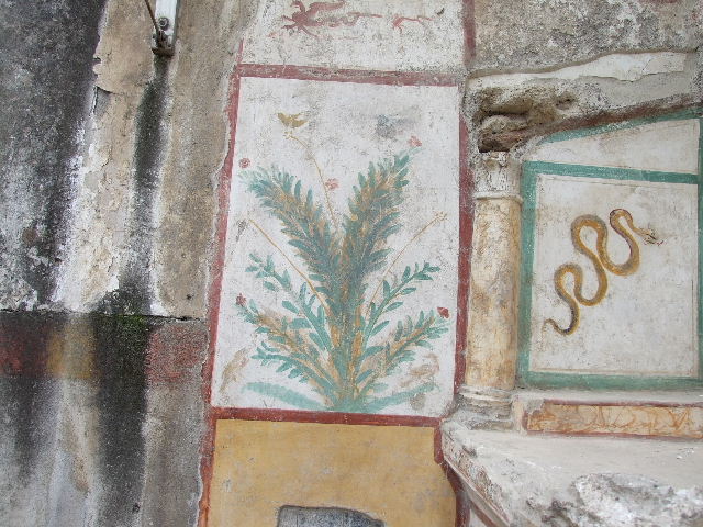 I.16.4 Pompeii. December 2006. Lararium, with detail of garden painting on the west wall..