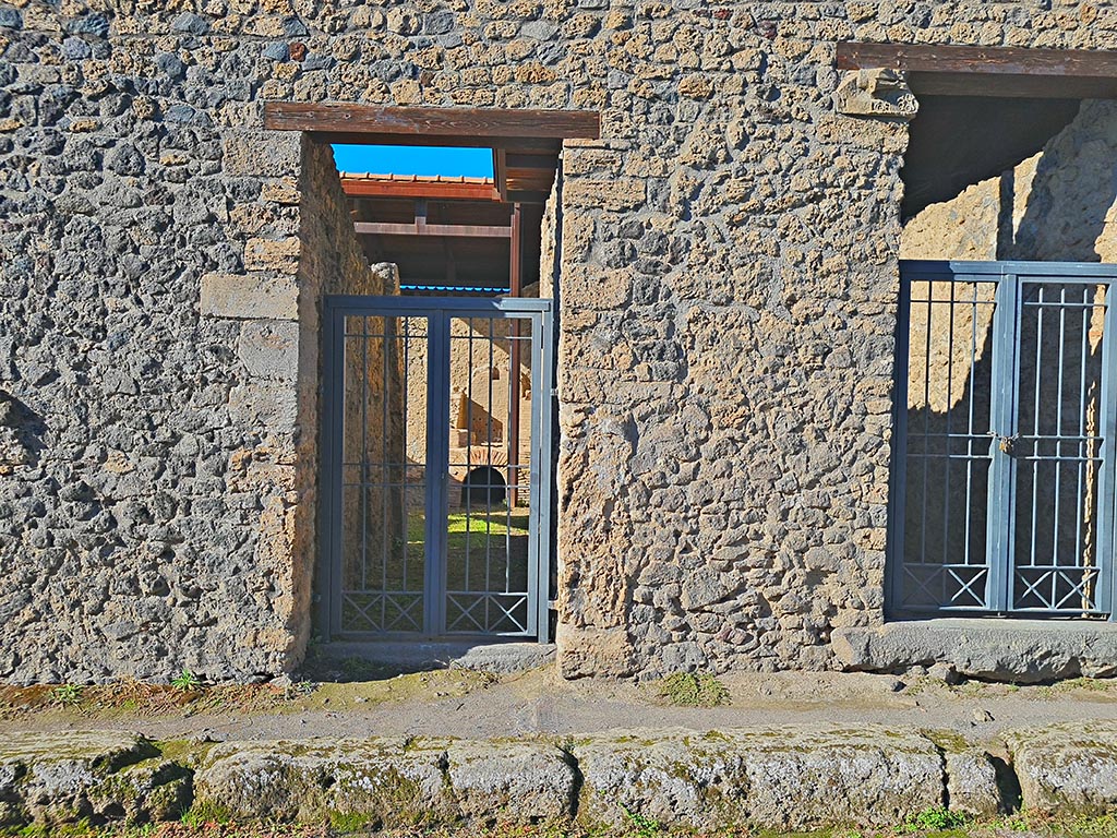 I.20.3, Pompeii, on left. October 2024. 
Looking west towards doorway on Via di Nocera, with I.20.4, on right. Photo courtesy of Giuseppe Ciaramella.
