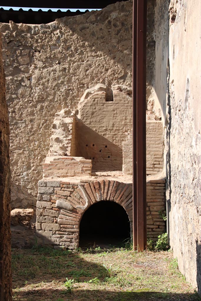 I.20.3 Pompeii October 2022. 
Looking west to oven in north-west corner. Photo courtesy of Klaus Heese.
