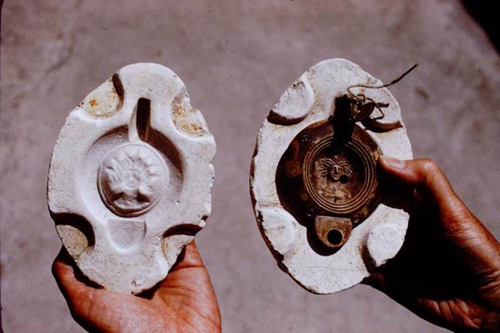 I.20.3 Pompeii. 1972. Lamp in its mould. Photo by Stanley A. Jashemski. 
Source: The Wilhelmina and Stanley A. Jashemski archive in the University of Maryland Library, Special Collections (See collection page) and made available under the Creative Commons Attribution-Non Commercial License v.4. See Licence and use details. J72f0120
