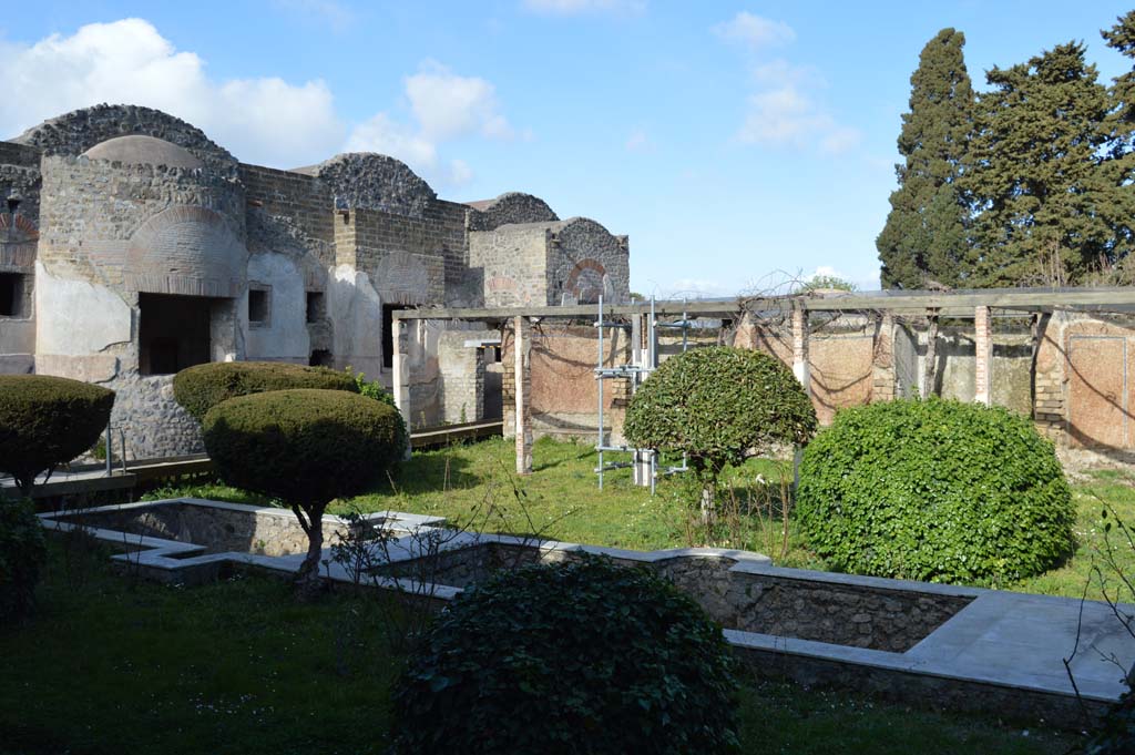 II.4.6 Pompeii. March 2019. 
Looking north-east from west portico across garden towards baths’ area, with large window from caldarium, on left. 
Foto Taylor Lauritsen, ERC Grant 681269 DÉCOR.

