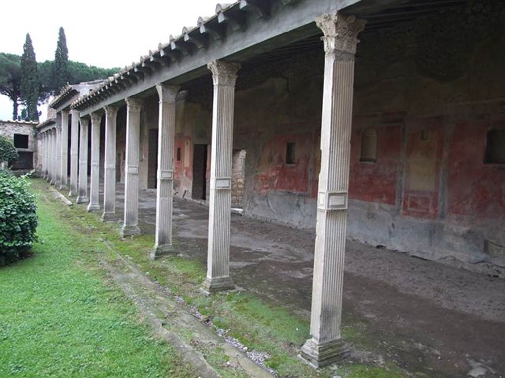 II.4.6 Pompeii. May 2016. Looking south along west wall of portico. Photo courtesy of Buzz Ferebee.