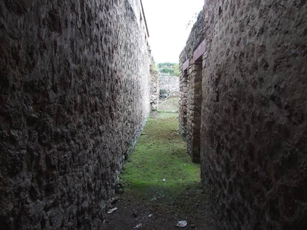 II.4.6 Pompeii. September 2019. Room on north side of summer triclinium.
Looking towards west wall, north-west corner and niche and doorway in north wall.
Photo courtesy of Klaus Heese.
