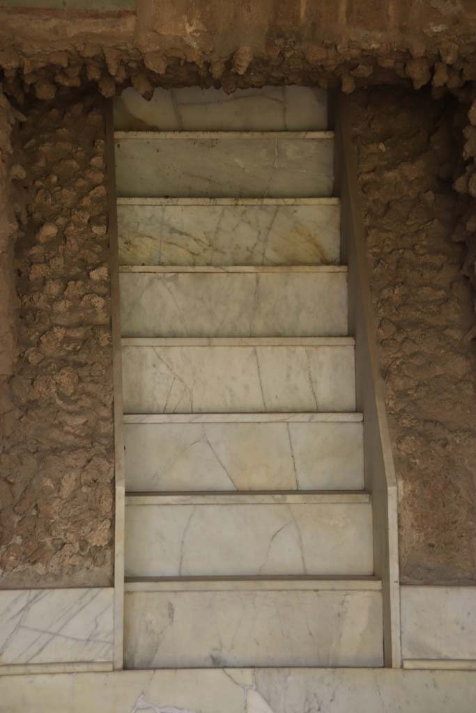 II.4.6 Pompeii. September 2019. Detail of the marble-covered masonry triclinium. Photo courtesy of Klaus Heese.