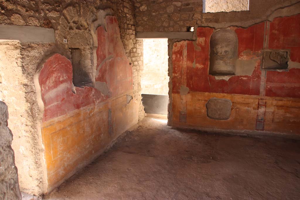 II.4.6 Pompeii. May 2016. Looking west from doorway of room at south end of west portico. Photo courtesy of Buzz Ferebee.
