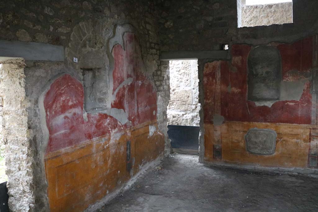 II.4.6 Pompeii. September 2019. 
Looking towards south wall, and doorway to rear corridor in south-west corner, in room at south end of west portico. 
Photo courtesy of Klaus Heese.
