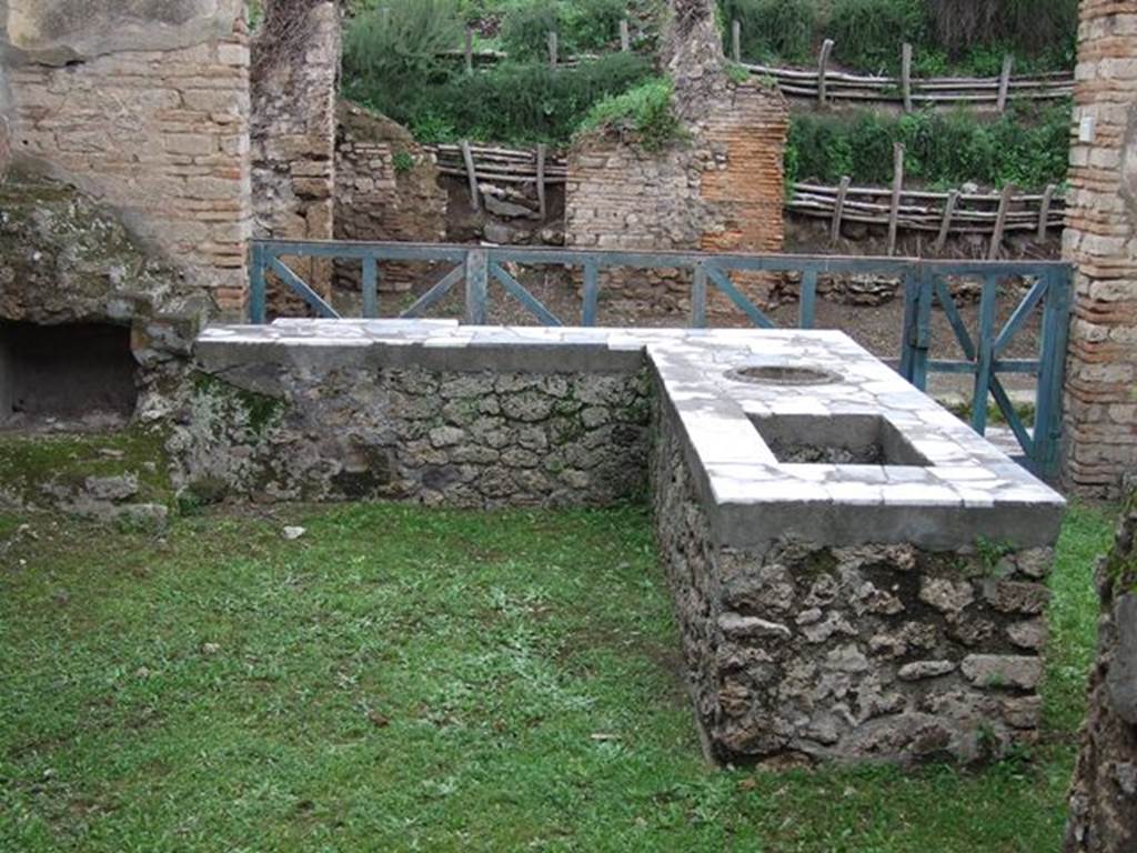 II.4.7 Pompeii. December 2006. Rear of food counter, looking north.