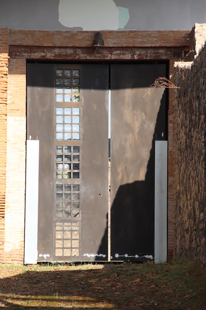 II.7.9 Pompeii. Palaestra. October 2023. Entrance doorway looking east from vicolo. Photo courtesy of Klaus Heese.