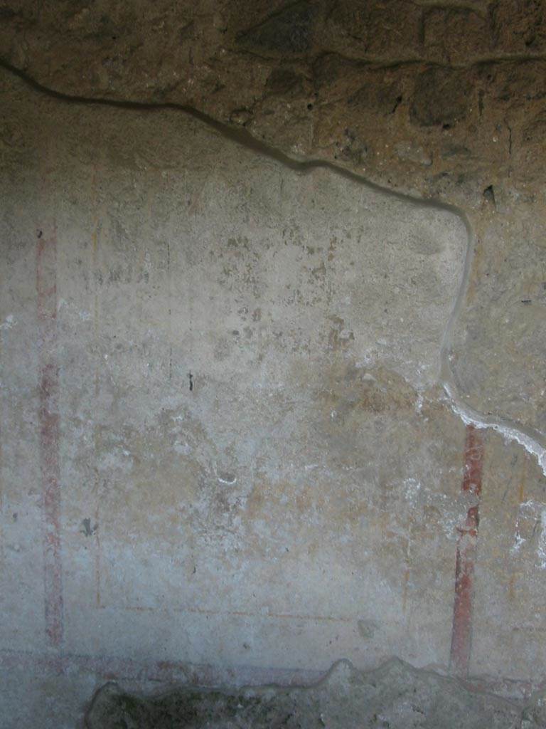 II.8.3 Pompeii. May 2003. 
East wall with remains of painted decoration. Photo courtesy of Nicolas Monteix. 
