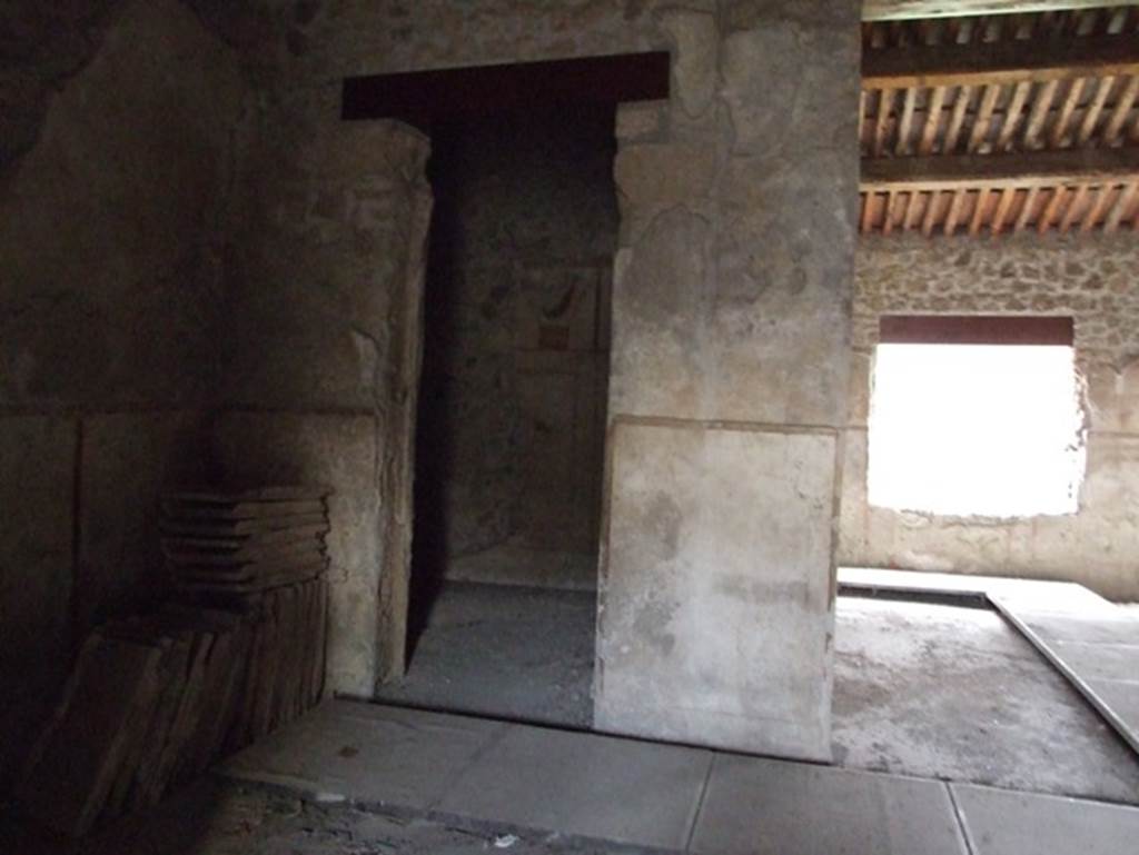 II.9.4 Pompeii. December 2007. Looking across room 2 atrium, towards doorway to room 4 in north-east corner of atrium.
Room 5, is on the right.
