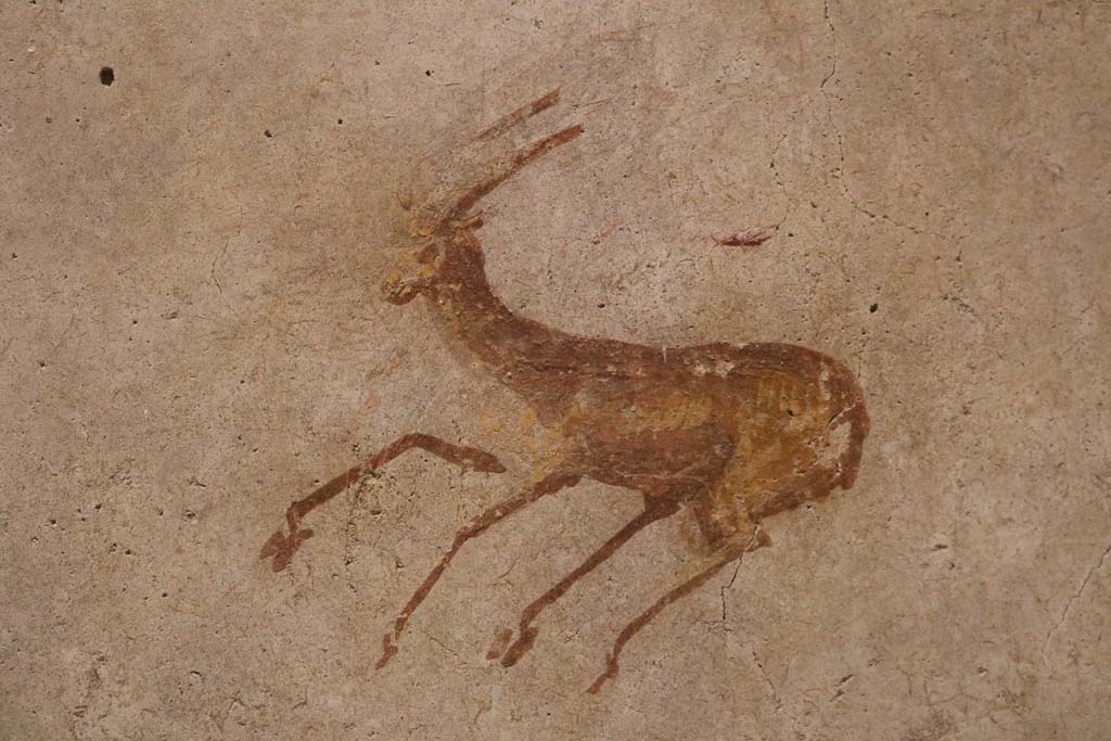II.9.4 Pompeii. December 2018. Room 4, detail of deer from centre of panel on east wall at south end.Photo courtesy of Aude Durand.