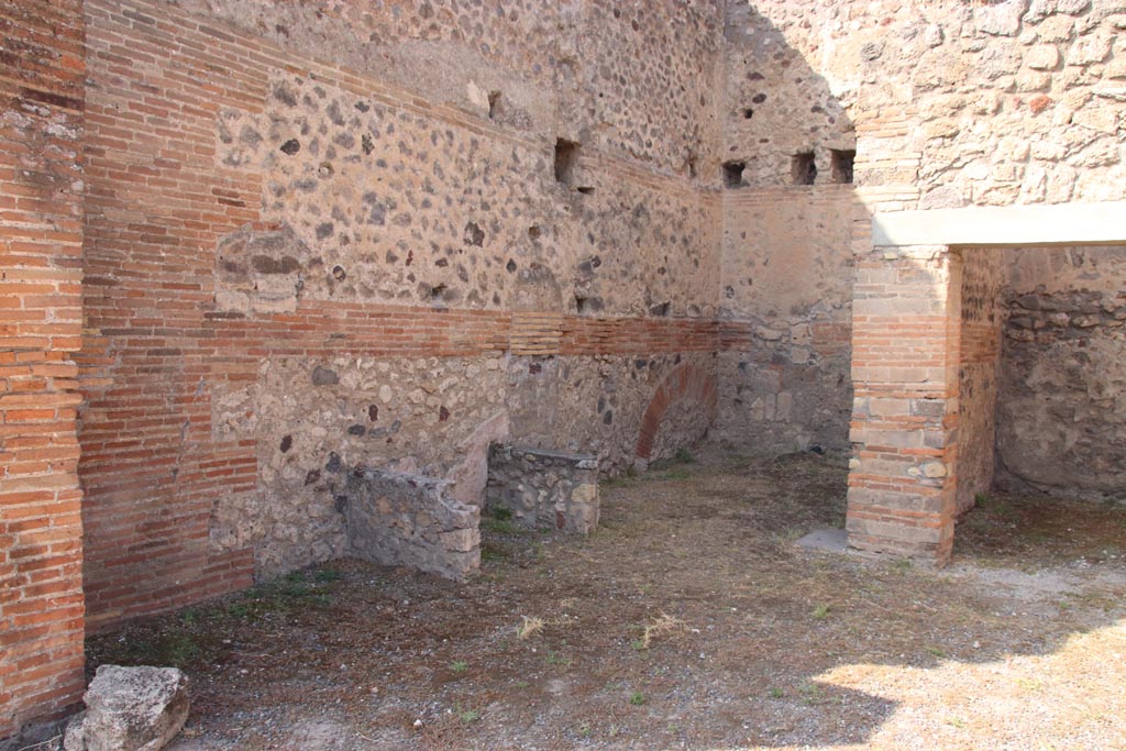 V.1.2 Pompeii. October 2023. Looking towards west wall of shop-room. Photo courtesy of Klaus Heese.