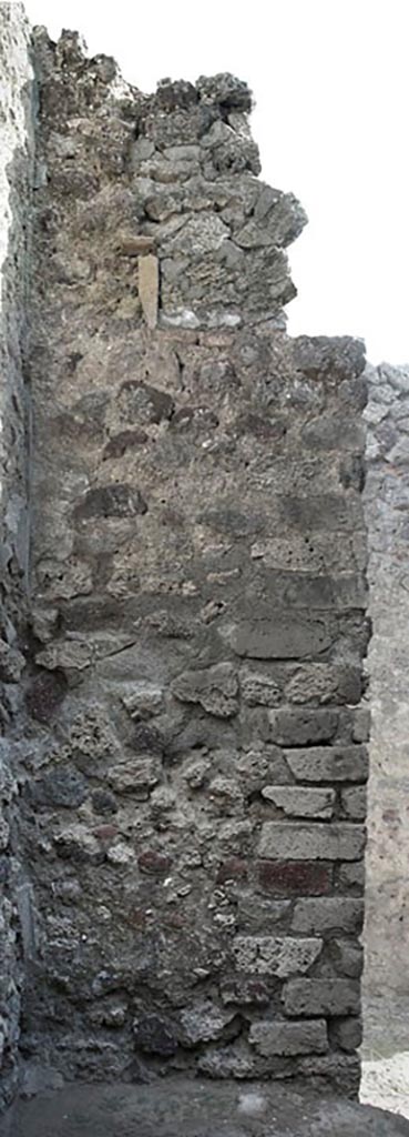 V.1.3 Pompeii. c.2008-10. 
Room “c”, east wall of outer room with doorway into corridor “b”, on right.  
Photo by Hans Thorwid.
Photo courtesy of the Swedish Pompeii Project. 
