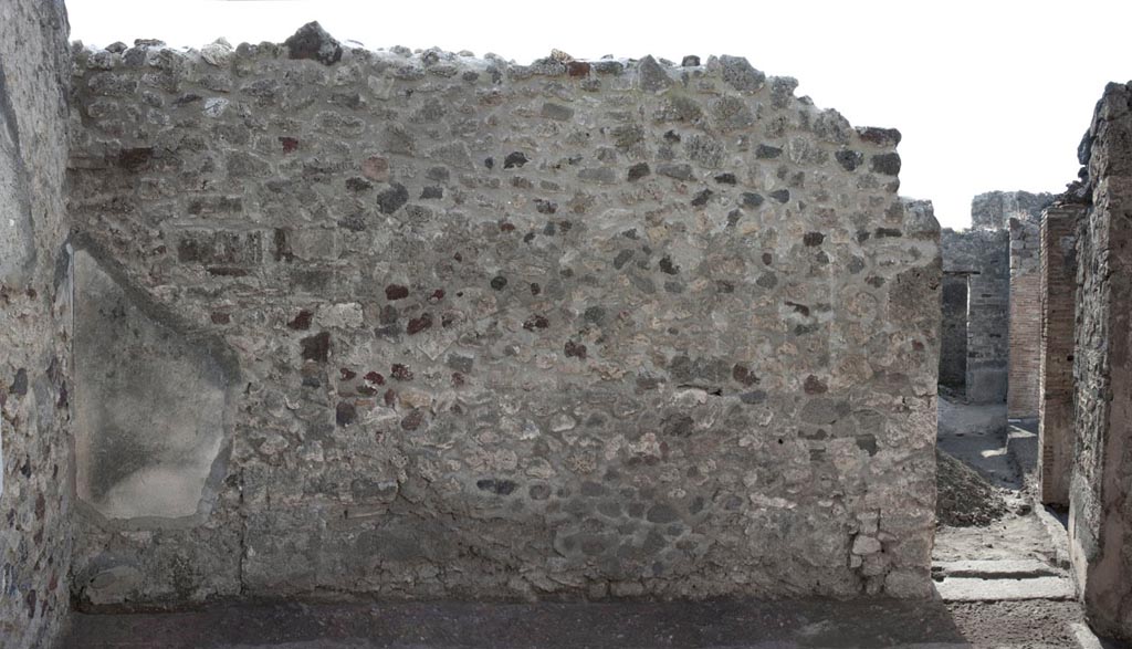 V.1.3 Pompeii. c.2012. Room 4, triclinium, west wall with doorway to atrium, on right. Photo by Hans Thorwid.
“W wall in 2012. Restored parts of the wall photographed and merge with the lower part and floor line of earlier photos from 2005-7.”
Photo and words courtesy of the Swedish Pompeii Project. 
