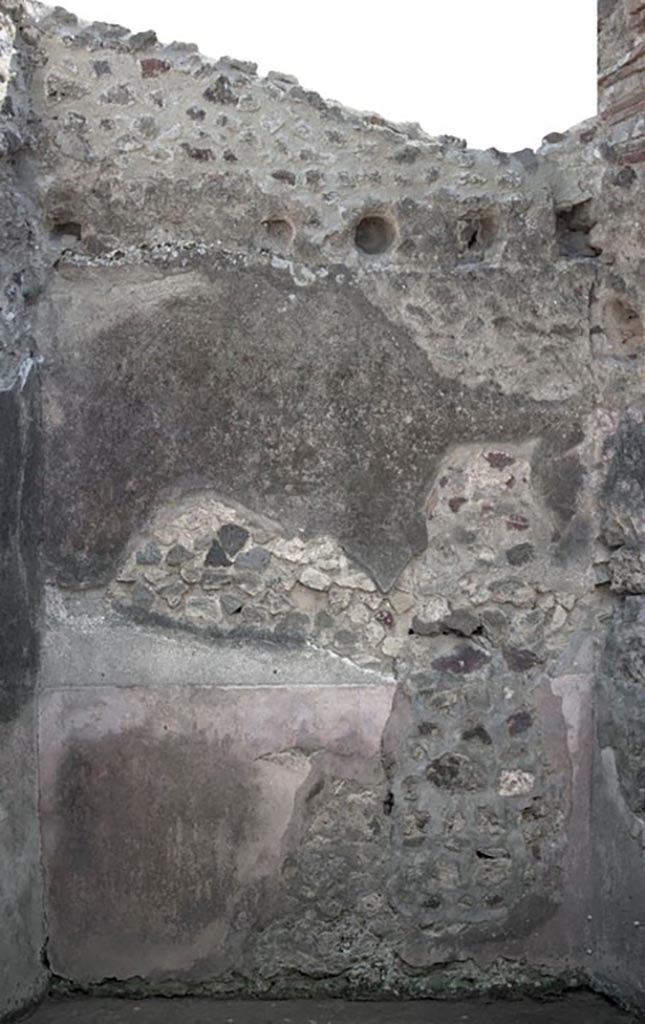 V.1.3 Pompeii. c.2012. 
Room 6, south wall. Photo by Hans Thorwid.
“S wall in 2012. Restored parts of the wall photographed and merge with the lower part and floor line of earlier photos from 2005-7.”
Photo and words courtesy of the Swedish Pompeii Project. 
