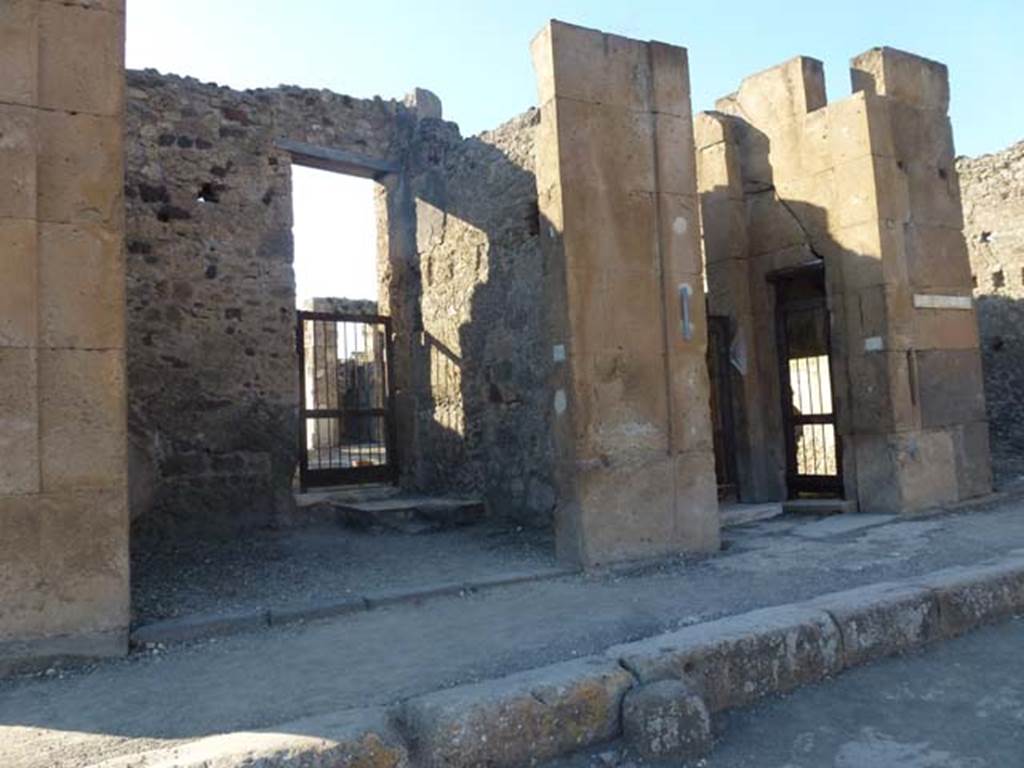 V.1.6 Pompeii, on left, and V.I.7, on right. June 2012. Looking north from Via di Nola, towards entrance doorways. Photo courtesy of Michael Binns.
