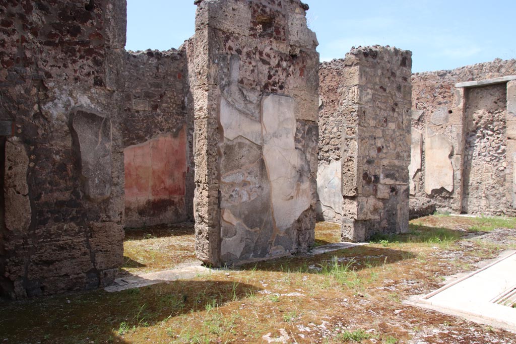 V.1.7 Pompeii. May 2024. Doorways to rooms 16, 15 and 14, on west side of atrium. Photo courtesy of Klaus Heese.