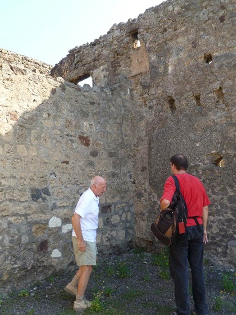 V.1.8 Pompeii. July 2010. Upper storey latrine in north-east corner of shop. Photo courtesy of Michael Binns.