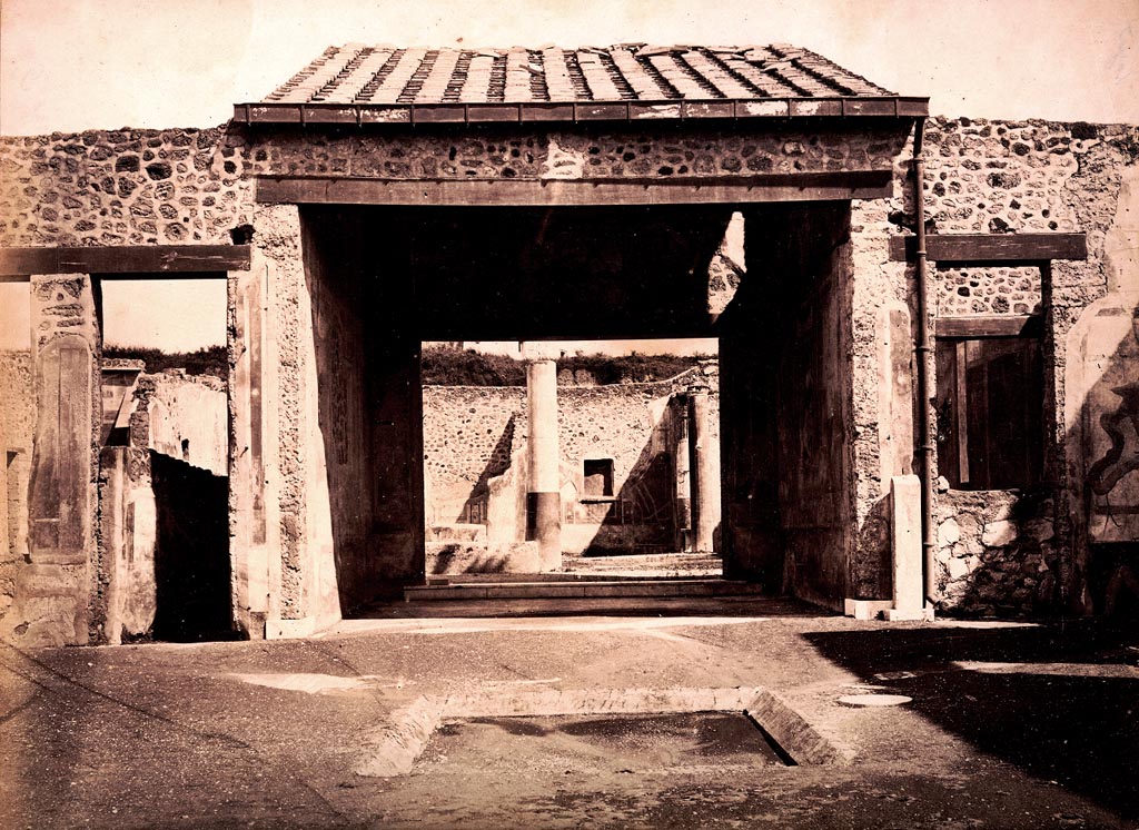 V.1.26 Pompeii. 19th century photograph. Looking east from atrium “b”. 
Written on the photograph is “Pompei 14, Casa del Cane, Scavi”. Photo courtesy of Espen B. Andersson.
