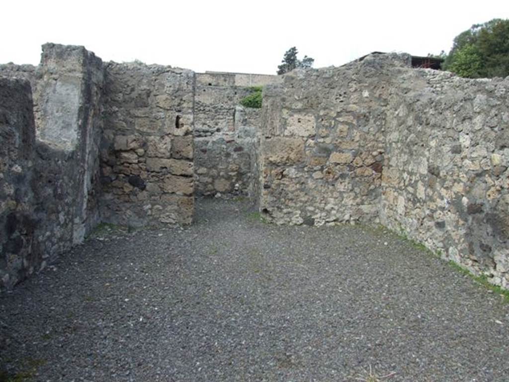 V.2.6 Pompeii. March 2009. Looking north across shop room to doorway to rear room.