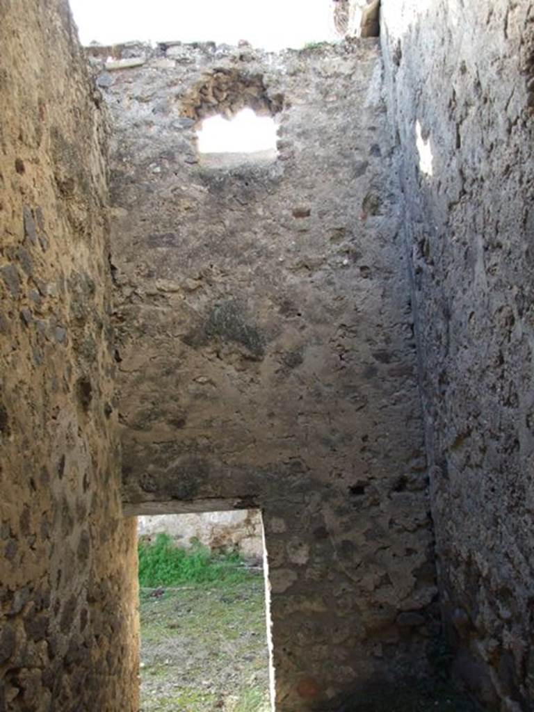 V.2.7 Pompeii. December 2007. Room 16, upper west wall and doorway to garden area.