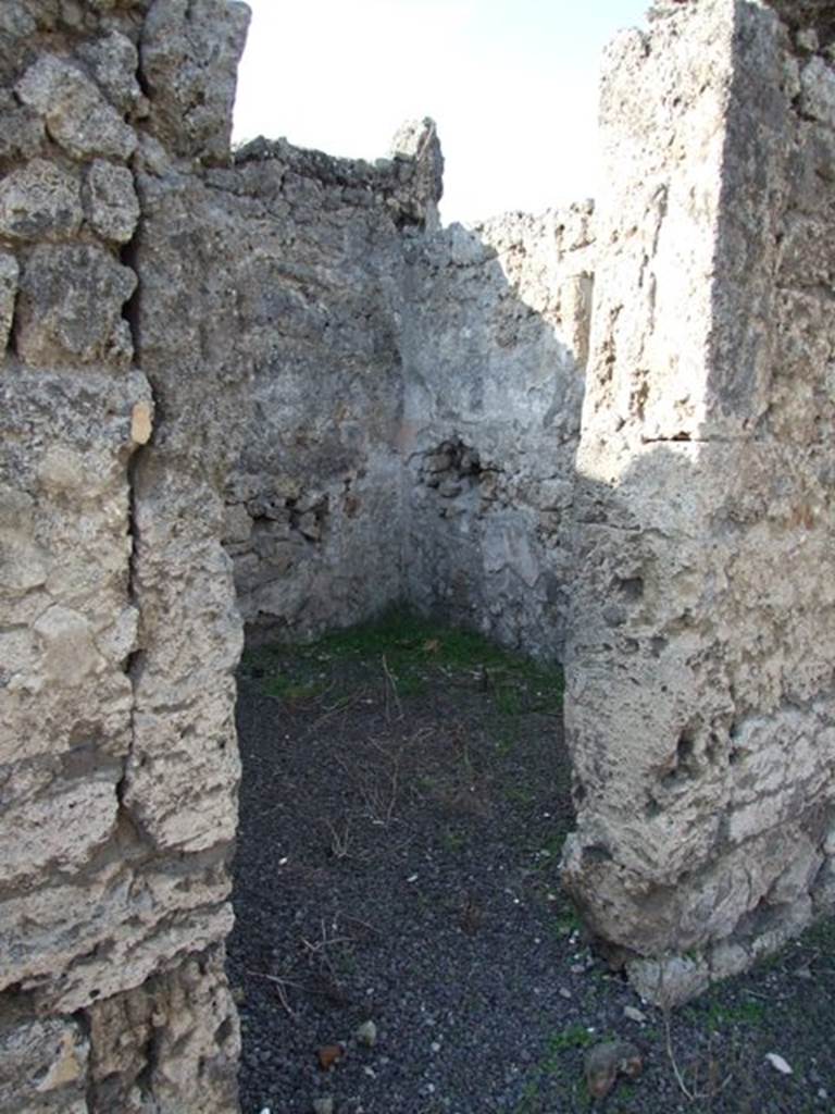 V.2.7 Pompeii. December 2007. 
Doorway to room 4, according to Mau painted in the last style on a white background.
