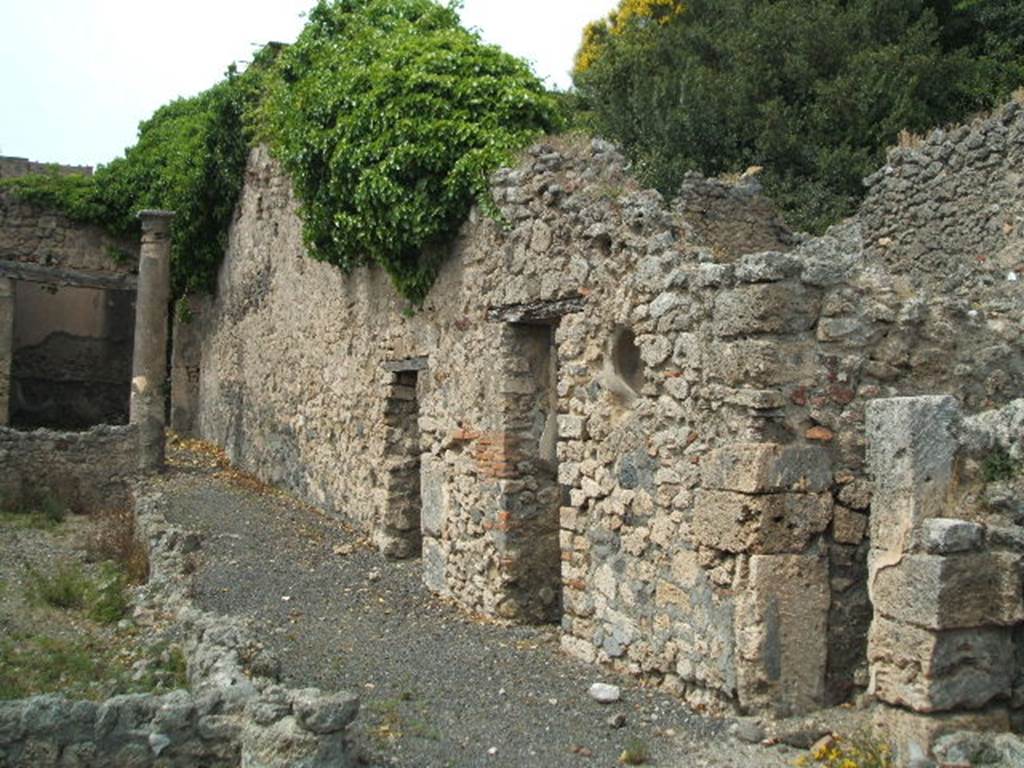 V.2.10 Pompeii. May 2005. East side of peristyle, with doorways to staircase and rooms 9 and 10.  