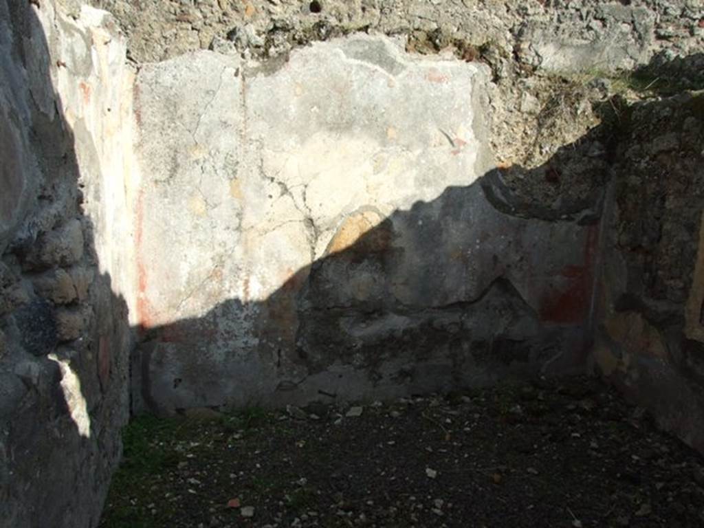 V.2.10 Pompeii. December 2007. Room 9, cubiculum. Looking east.
According to NdS, this cubiculum had walls with a red background, and on these were found four paintings 
Daedalus and Icarus (Naples Archaeological Museum. Inventory number 9245) was found on the north wall (on right).
Sanctuary of Diana/Isis with Hippolytus was found on the south wall.
Marsyas, Minerva and the Muses (Naples Archaeological Museum inventory number 120626) was found on the east wall.
A painting of Hercules and the Hesperides was found on the west wall. 
See Notizie degli Scavi, 1891, (p.269 onwards).
See Schefold, K., 1957. Die Wande Pompejis. Berlin: De Gruyter. (p.72)
See Peters, W.J.T. (1963): Landscape in Romano-Campanian Mural Paintings. The Netherland, Van Gorcum & Comp. (p.82-84 & Pls.68-71)
