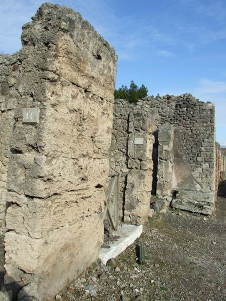 V.2.15 Pompeii. December 2007. Entrance doorway, looking east along Via di Nola.