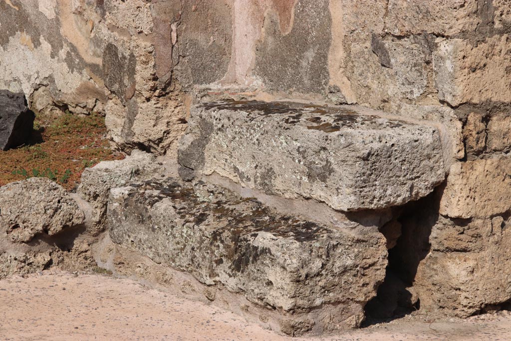 V.2.16 Pompeii. October 2022. Two stone steps on east side of entrance doorway on Via di Nola. Photo courtesy of Klaus Heese.