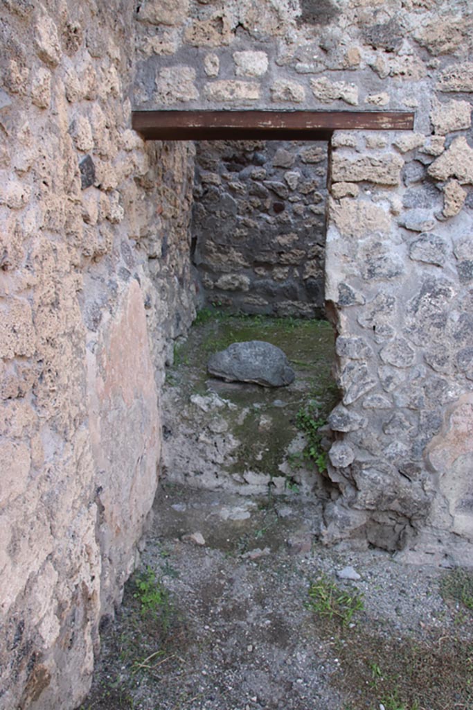 V.2.17 Pompeii. October 2022. 
Looking north through doorway into rear room. Photo courtesy of Klaus Heese.
