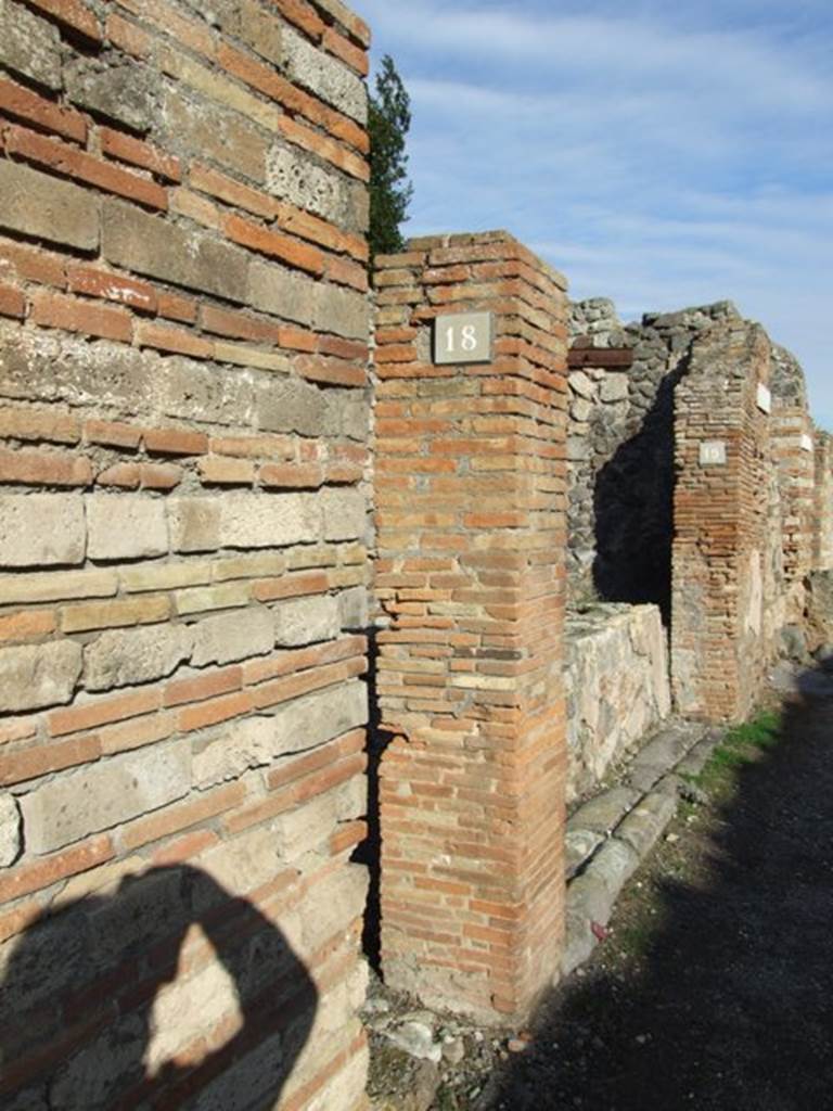 V.2.18 Pompeii. December 2007. Steps to upper floor, and looking east along front of V.2.19.