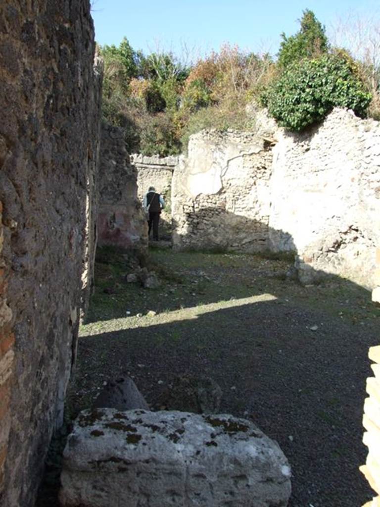 V.2.19 Pompeii. December 2007. Looking north from V.2.18 steps to upper floor along west wall.