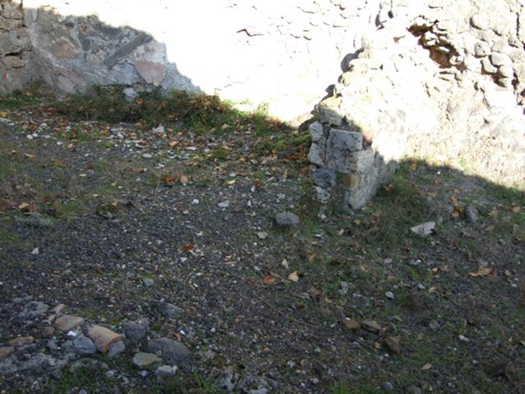 V.2.19 Pompeii. December 2007. Remains of dividing north wall between front and rear rooms.