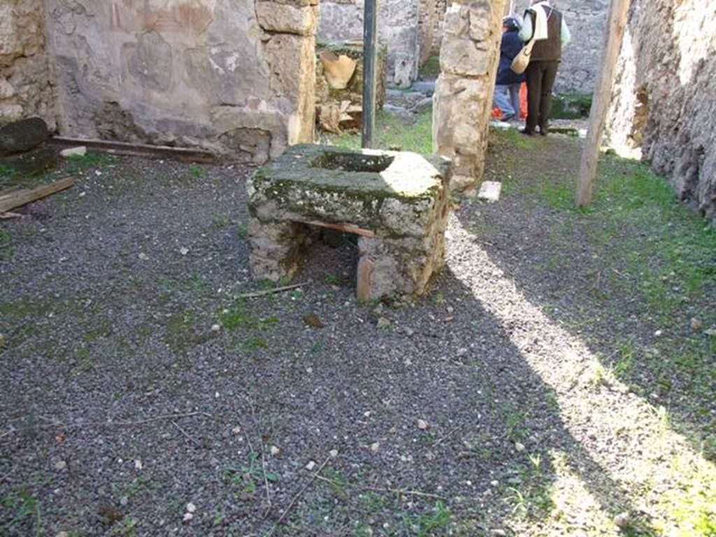 V.2.c Pompeii. December 2007. Room “b”. Looking back to V.2.b and entrance corridor “a”.
On the wall to the left was a wooden staircase, leading upstairs, probably to two rooms above V.2.b and corridor “a”.
These rooms were possibly the home of the people who ran the thermopolium.

