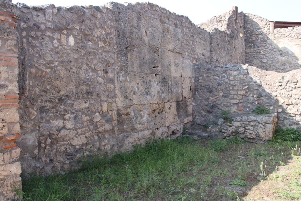 V.3.3 Pompeii. October 2023. Looking north along west wall of shop. Photo courtesy of Klaus Heese.