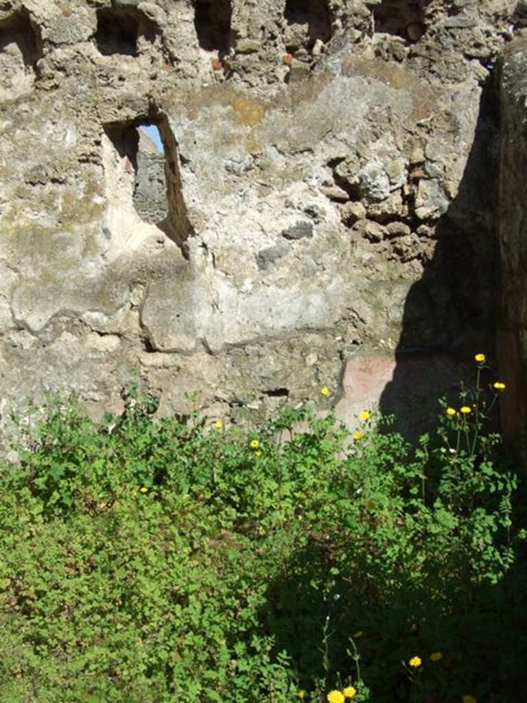 V.3.4 Pompeii. March 2009. Northern room on East side.  East wall with small window.