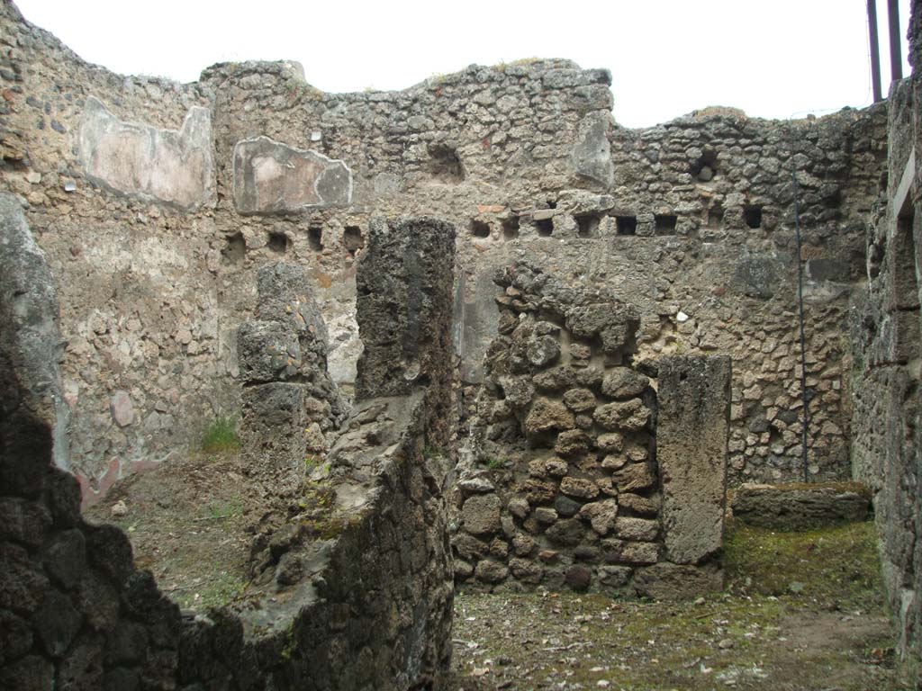 V.3.4 Pompeii, May 2005. Looking east, towards remains of stairs to upper floor. 