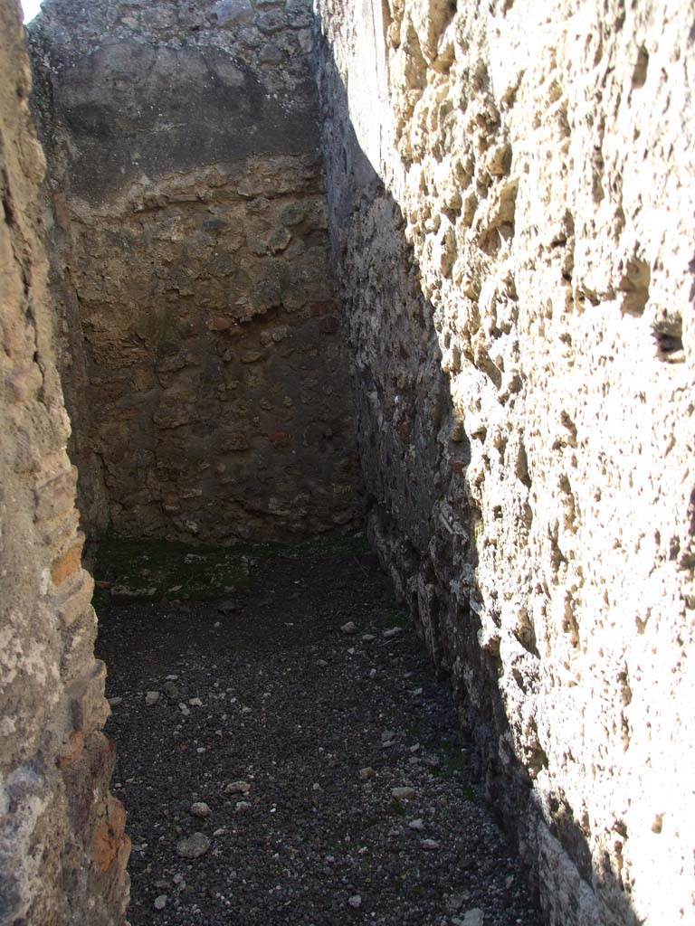 V.3.8 Pompeii. March 2009. North wall of narrow room on west side of entrance corridor. 