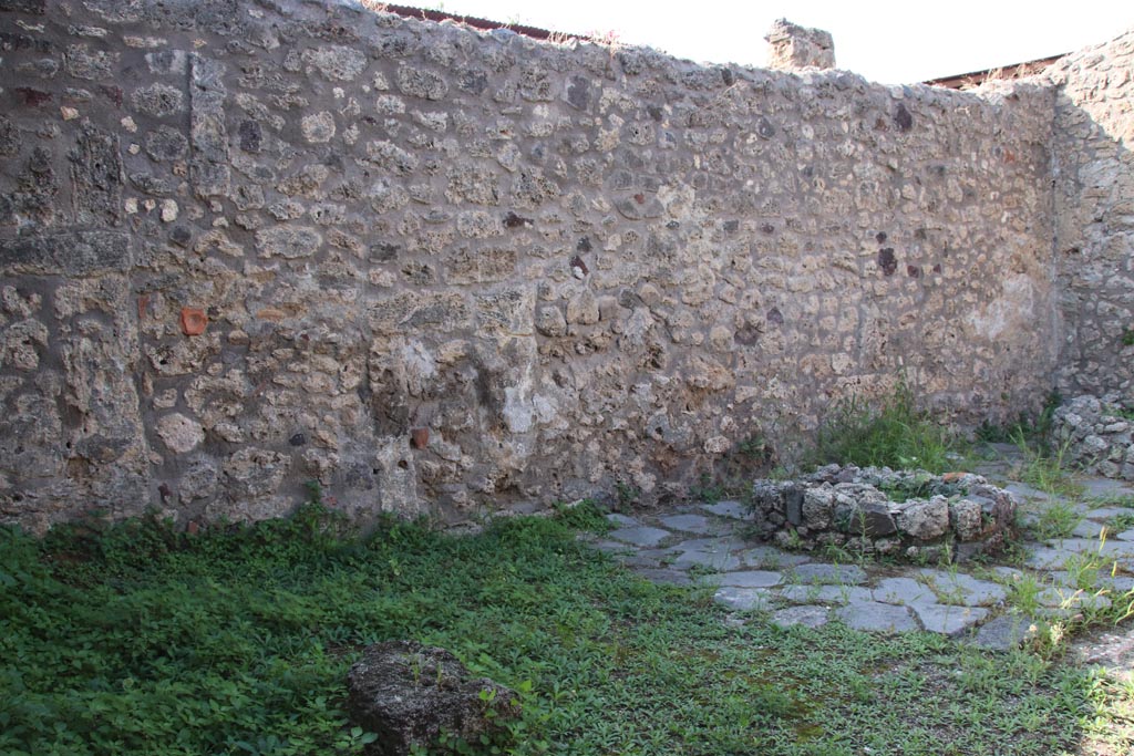 V.3.8 Pompeii. October 2023. Looking towards west wall of atrium used as a bakery. Photo courtesy of Klaus Heese.