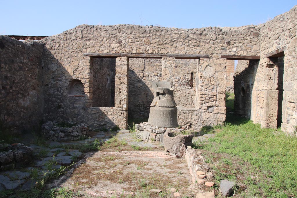 V.3.8 Pompeii. October 2023. Looking north across impluvium in atrium bakery area. Photo courtesy of Klaus Heese.