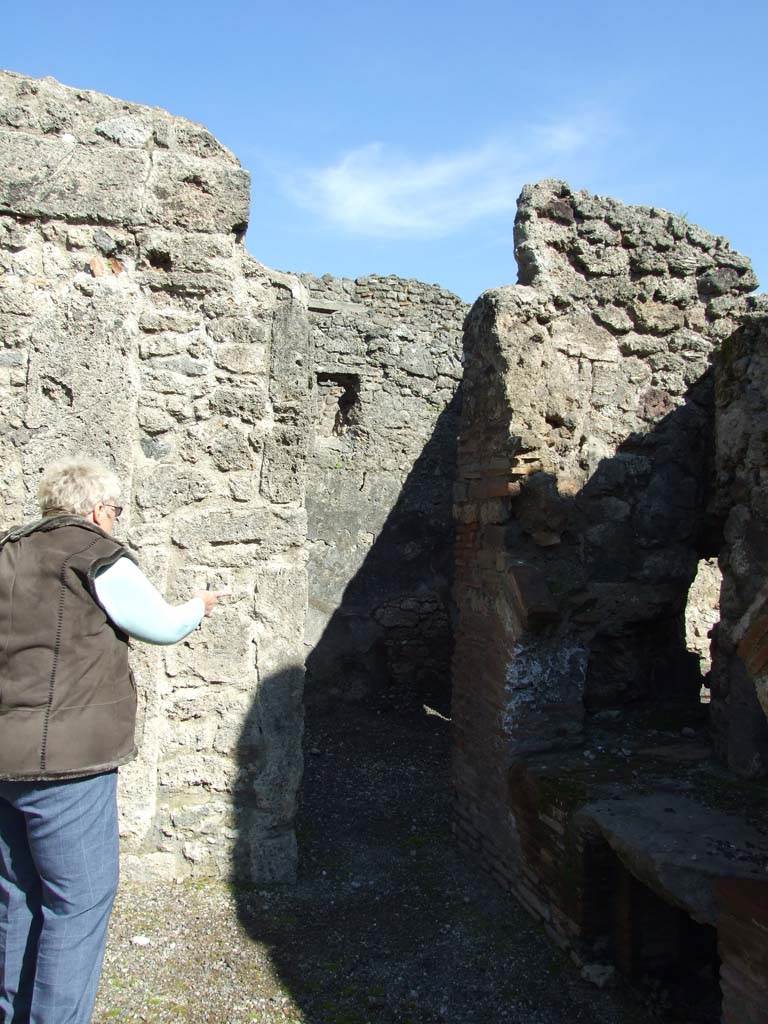 V.3.8 Pompeii. March 2009. Entrance door to small room on east side of oven.  