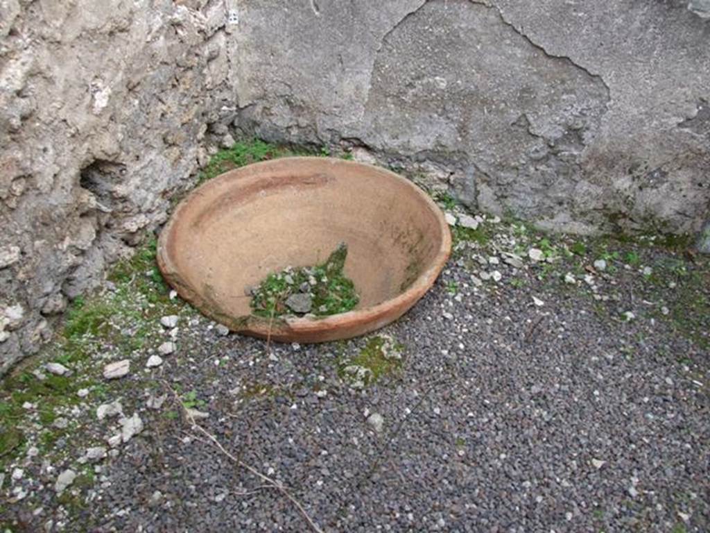 V.3.8 Pompeii.  December 2007.  Small room on east side of oven.   Terracotta bowl in north east corner.